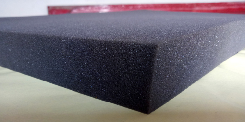 blue styrofoam that goes into a mattress