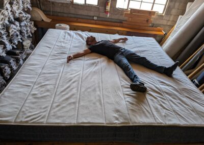 man laying on alaskan mattress
