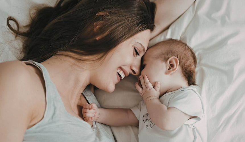 Mother and baby on a Delarkin Wyoming King mattress.
